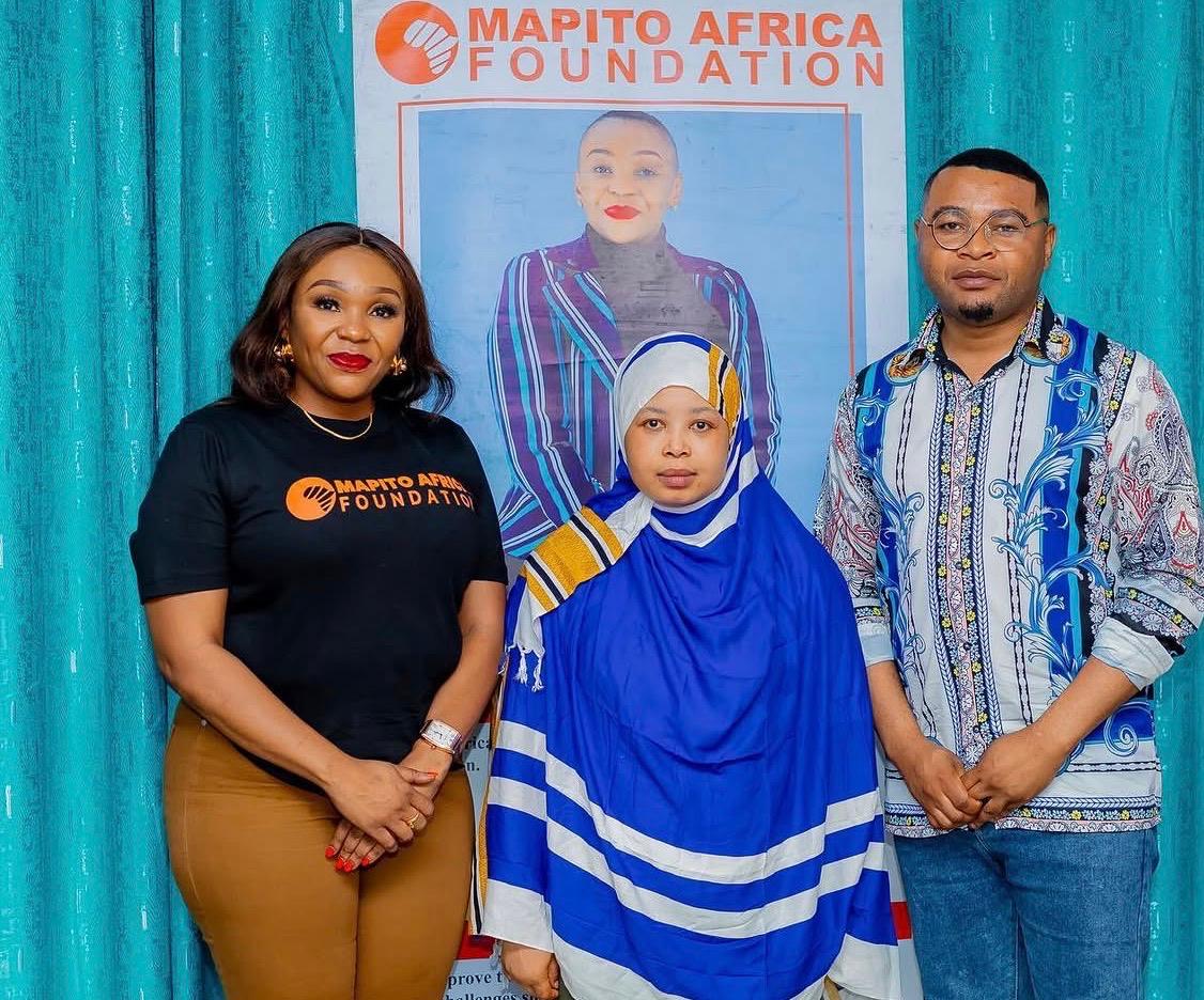 Mapito Africa Foundation team members holding meeting in Tanzania